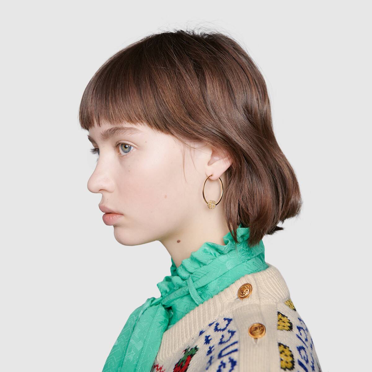 Orecchini Cerchi Gucci GG Running con diamanti