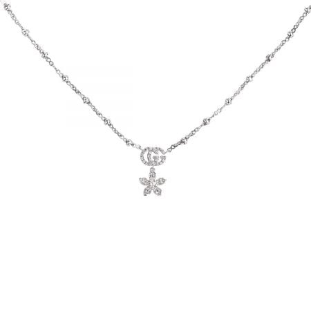 Collana Gucci fiore e Doppia G con diamanti